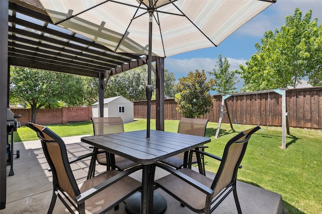 view of patio / terrace with a shed