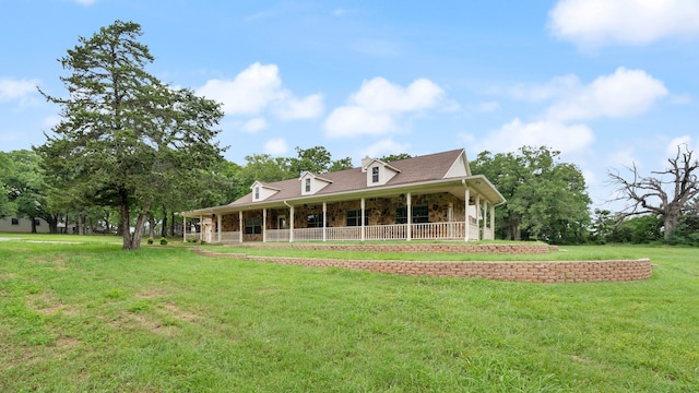 back of house with a porch and a lawn