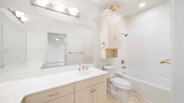 full bathroom with vanity, toilet, tub / shower combination, and ceiling fan