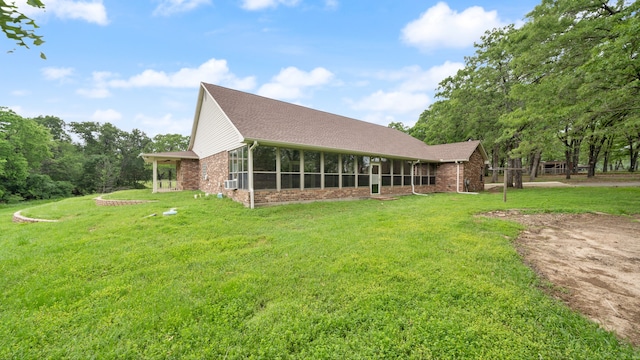 exterior space with a yard