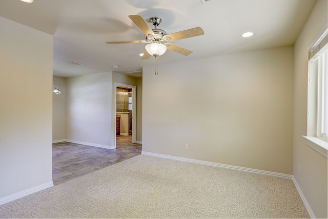 empty room featuring ceiling fan