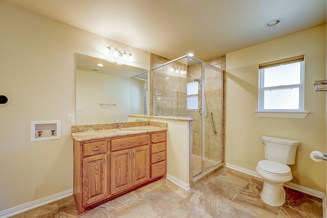 bathroom featuring walk in shower, vanity, and toilet