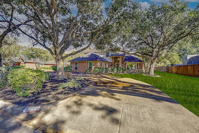 view of front of house with a front lawn