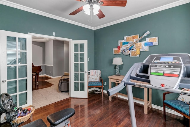 interior space with french doors, crown molding, wood-type flooring, and ceiling fan