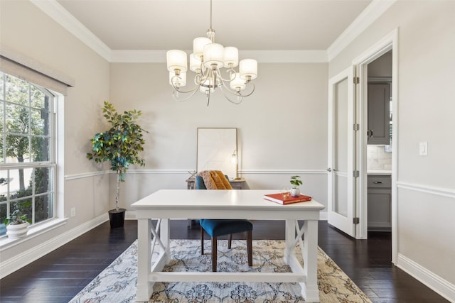 office area featuring dark wood-type flooring, ornamental molding, and a chandelier