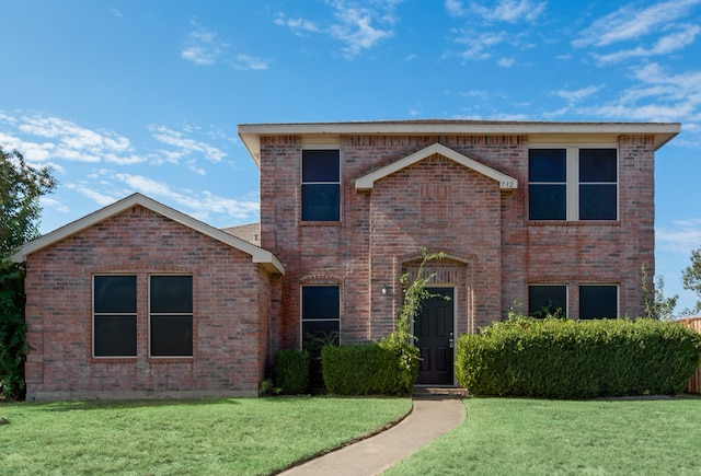 view of front property featuring a front yard