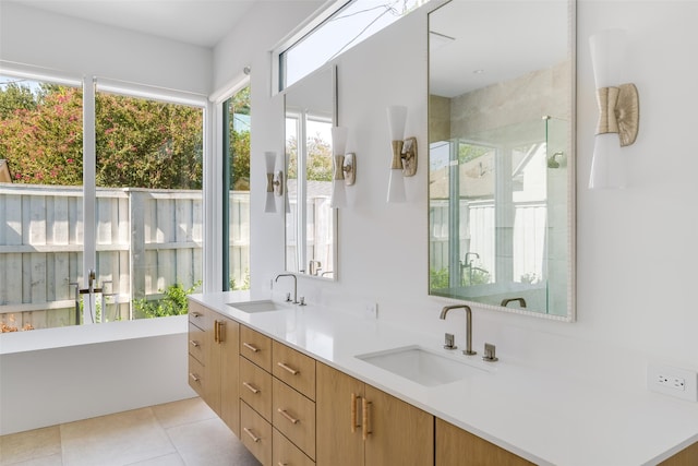 bathroom with vanity, independent shower and bath, and tile patterned floors