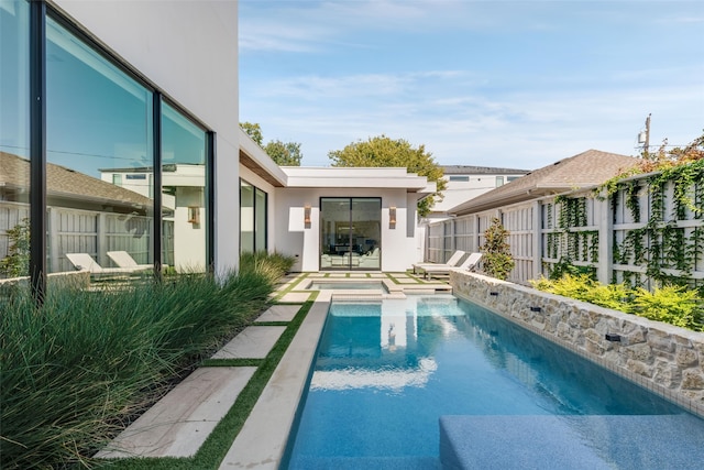 view of swimming pool with a patio