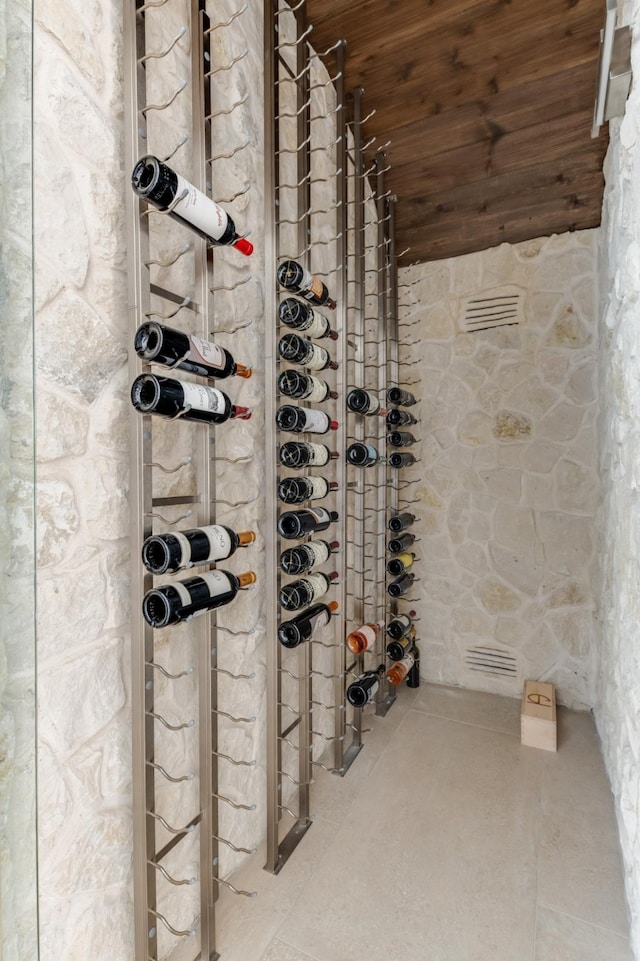 wine area with wooden ceiling