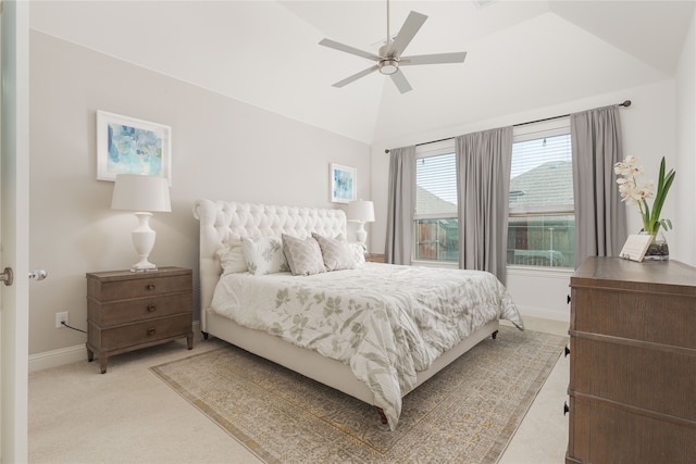 bedroom with lofted ceiling, carpet flooring, and ceiling fan