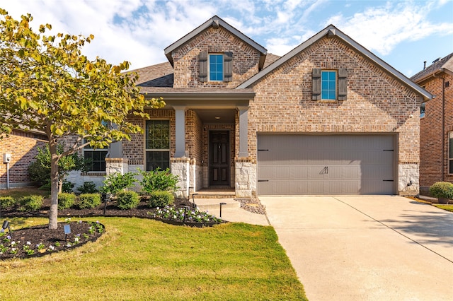 craftsman inspired home featuring a front yard and a garage