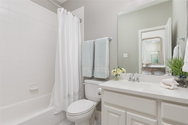 full bathroom featuring vanity, toilet, and shower / tub combo