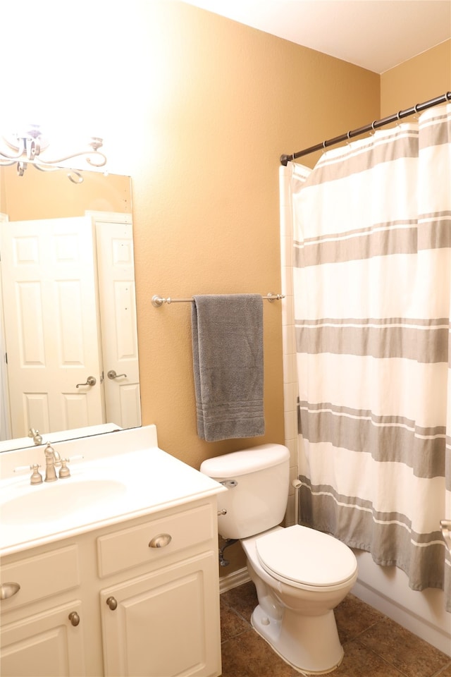 full bathroom featuring vanity, shower / bath combo, toilet, and tile patterned flooring