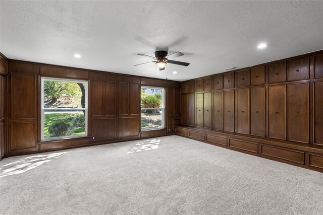 320 Arapaho W, Sherman, TX 75092 - carpeted spare room featuring ceiling fan, a textured ceiling, and recessed lighting