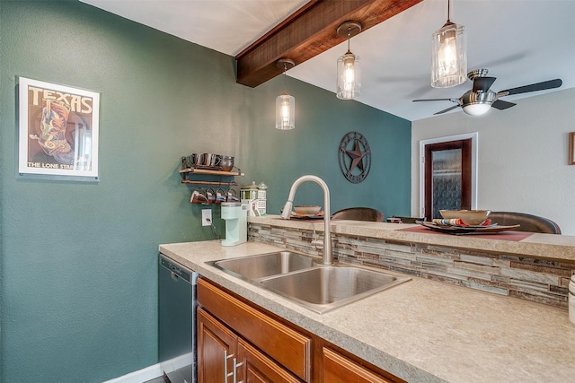 kitchen featuring dishwasher, beam ceiling, hanging light fixtures, and sink