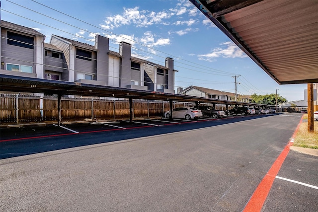 view of parking with a carport