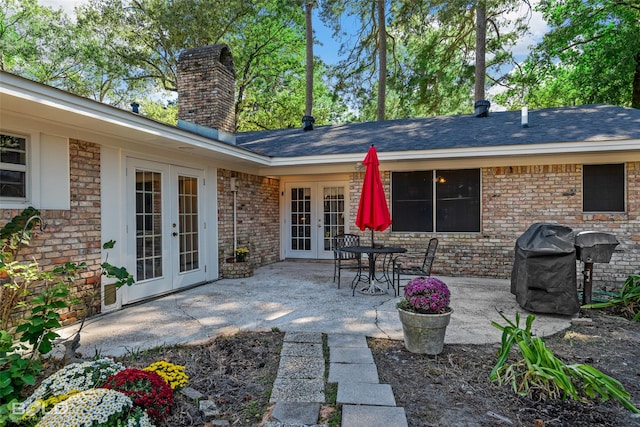 view of patio / terrace featuring grilling area and french doors