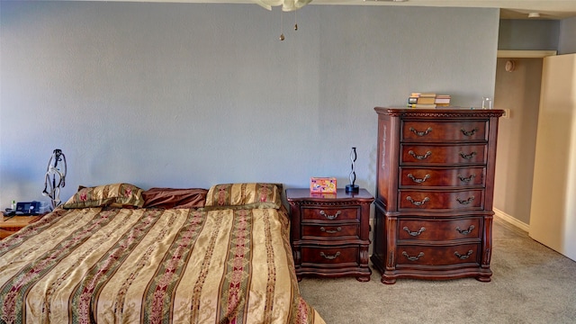 bedroom featuring light colored carpet