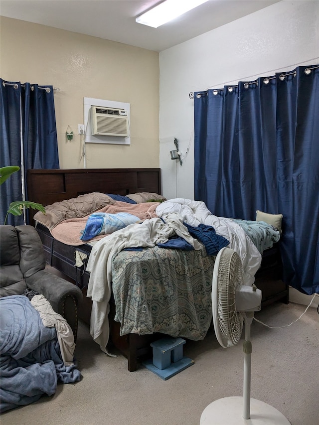 carpeted bedroom featuring a wall mounted AC