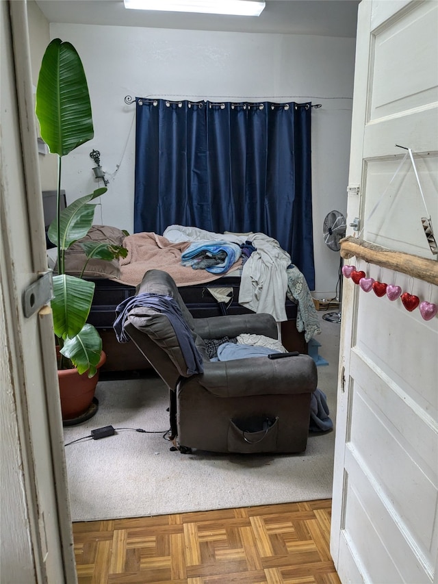 bedroom featuring light parquet floors