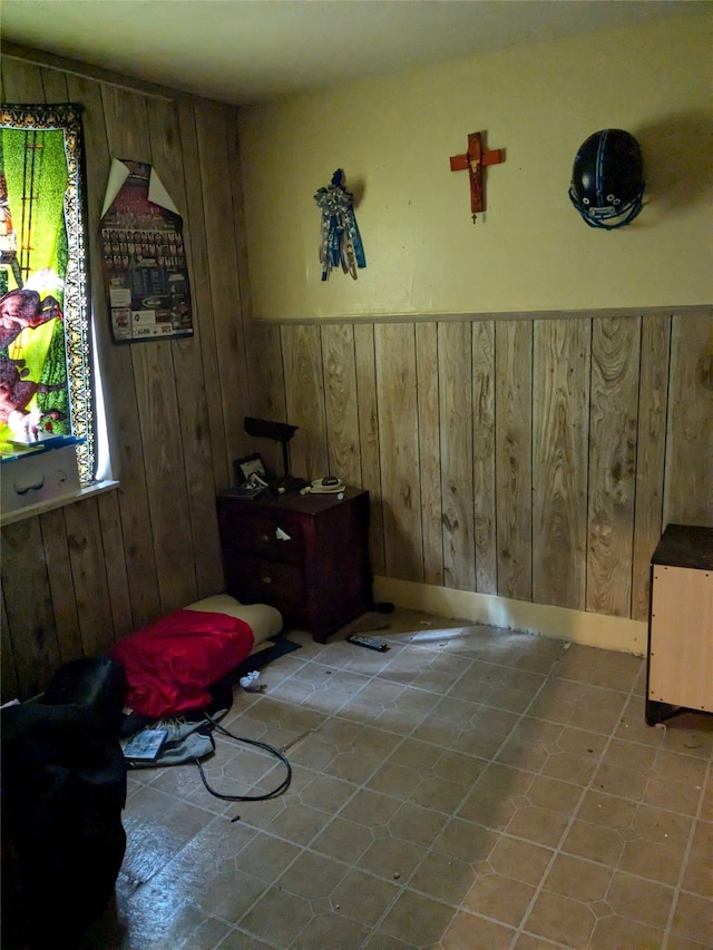 interior space featuring wood walls