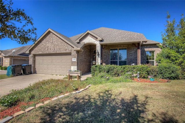 single story home featuring a garage and a front lawn