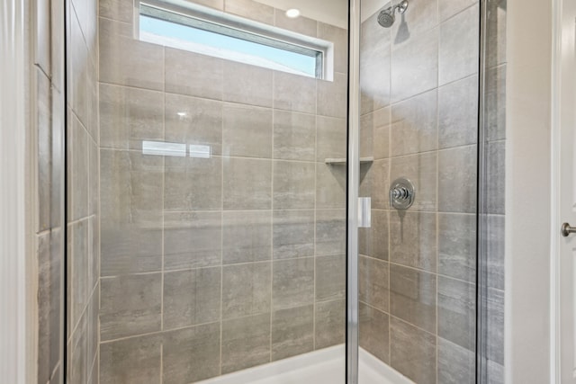 bathroom featuring walk in shower