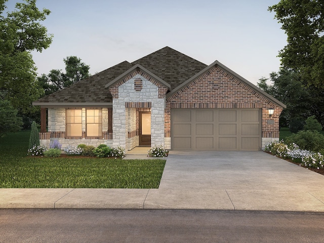 view of front of house with a lawn and a garage