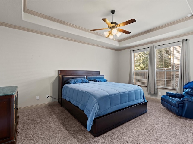 3809 S Brookridge Ct, Bedford, TX 76021 - carpeted bedroom featuring baseboards, a raised ceiling, crown molding, and ceiling fan