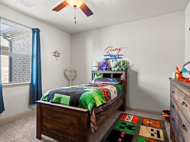 carpeted bedroom featuring ceiling fan