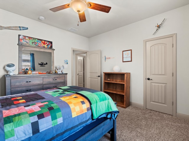 carpeted bedroom with ceiling fan