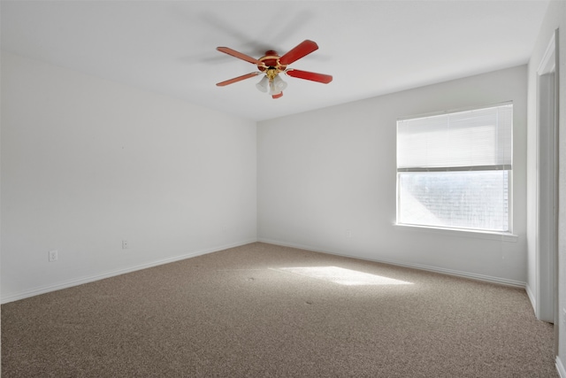 unfurnished room featuring carpet floors and ceiling fan