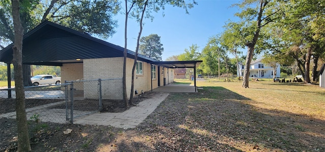 view of property exterior featuring a lawn