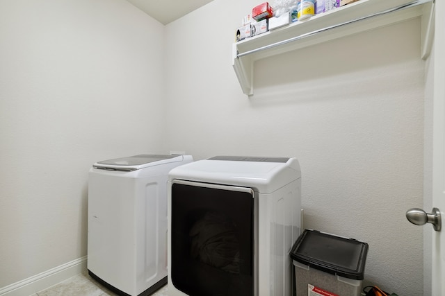 laundry area with washing machine and dryer