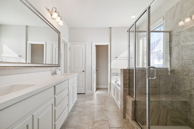 bathroom with vanity and an enclosed shower