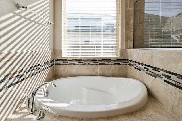 bathroom with a tub