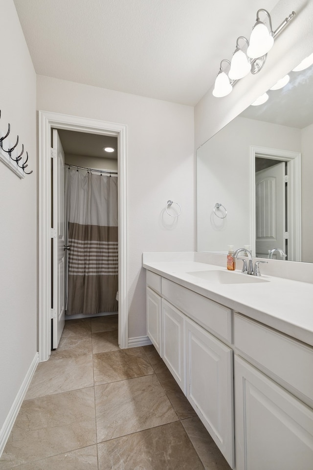 bathroom featuring vanity and tile patterned floors