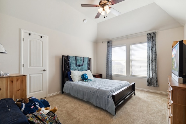 carpeted bedroom with lofted ceiling and ceiling fan