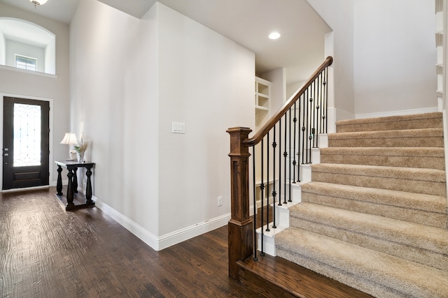 foyer entrance featuring dark hardwood / wood-style flooring