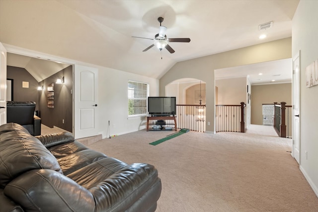 carpeted living room featuring lofted ceiling and ceiling fan