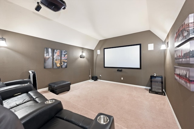 carpeted cinema with vaulted ceiling