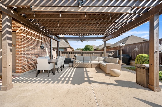 view of patio with outdoor lounge area and a pergola