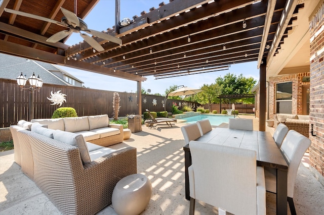 view of patio with a pergola, ceiling fan, a fenced in pool, and an outdoor hangout area