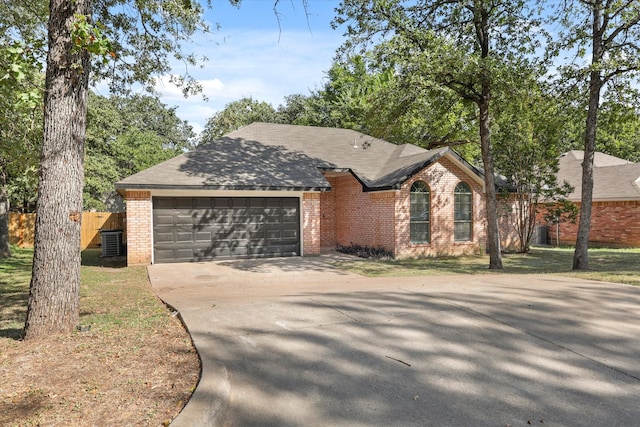 ranch-style home with a garage