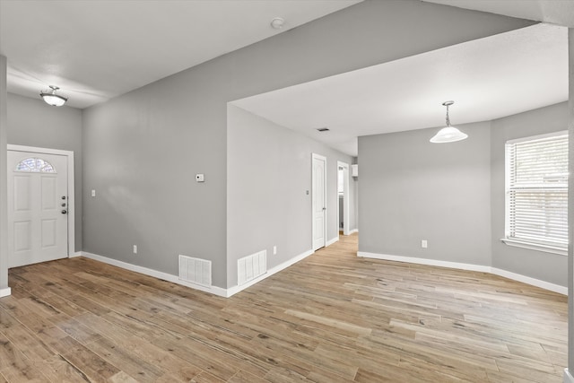 entrance foyer with light hardwood / wood-style floors