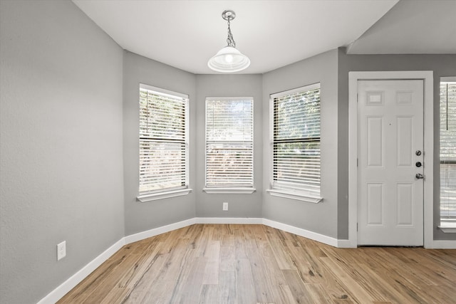 foyer with light wood-type flooring