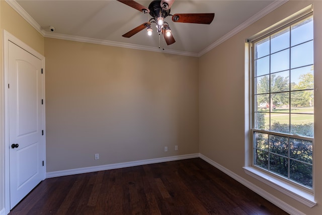 spare room featuring ornamental molding, ceiling fan, and dark hardwood / wood-style flooring