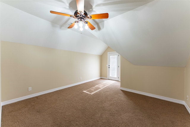 bonus room with lofted ceiling, carpet flooring, and ceiling fan