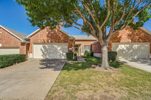 view of front of house featuring a garage and a front yard