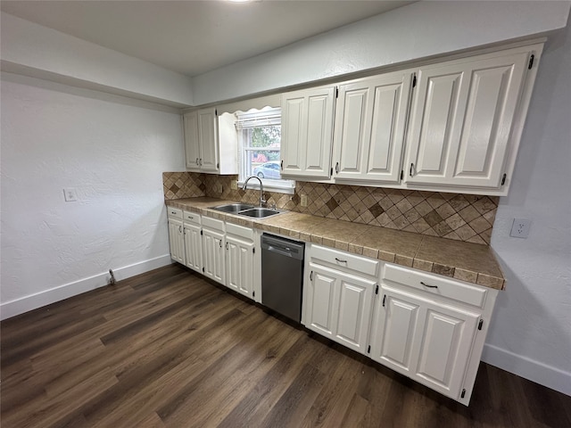 kitchen with sink, dark wood-type flooring, dishwasher, white cabinetry, and tasteful backsplash